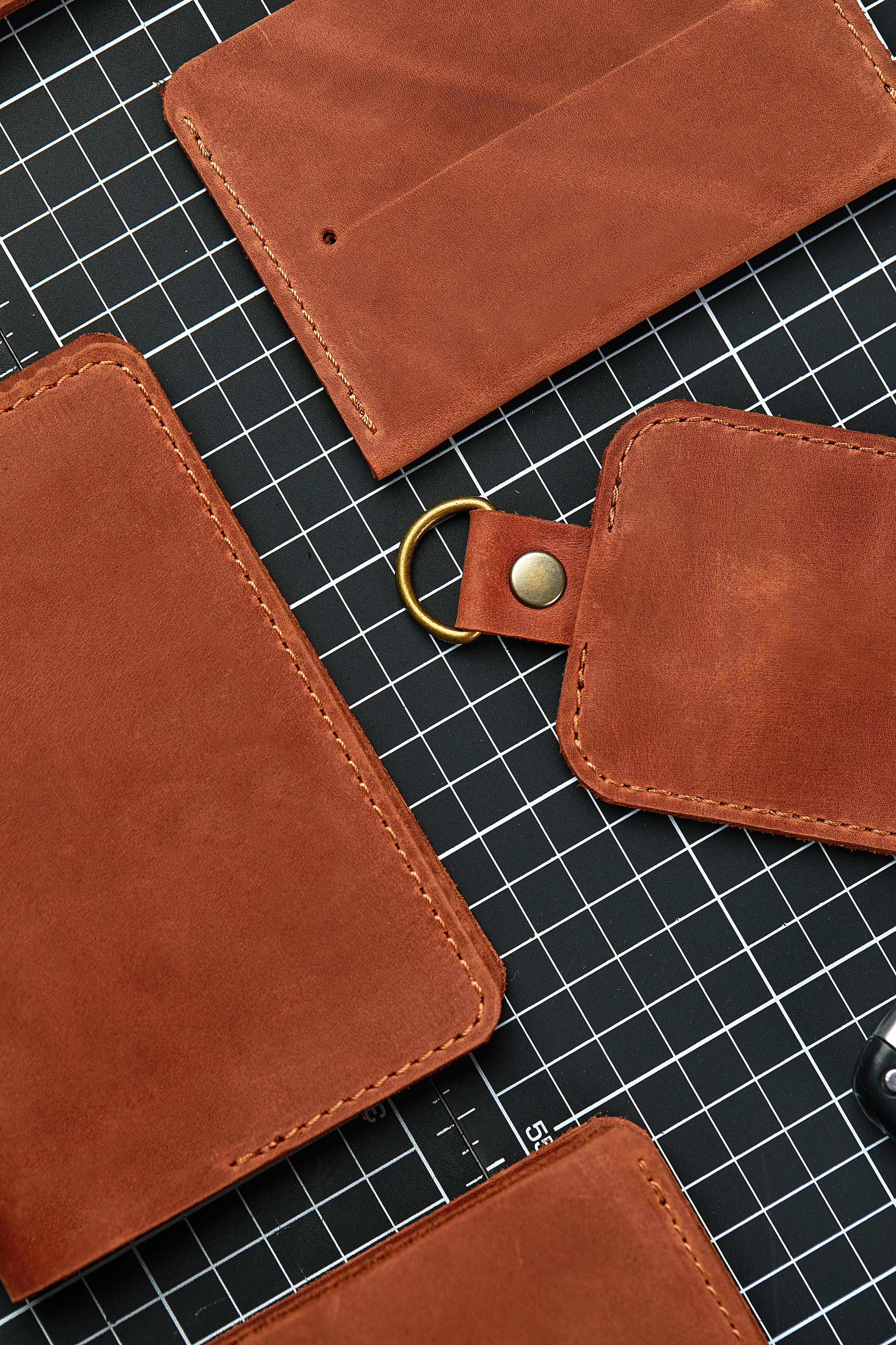 Set of handmade leather goods, key holder rings, wallet, purse, notepad, handbook. Handcrafted